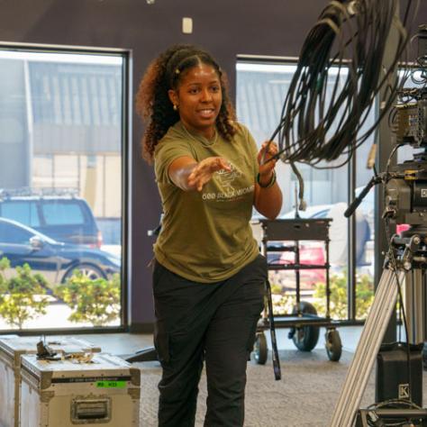 Woman working with cables.