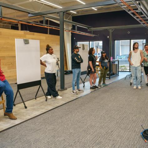 People watching a presentation. 