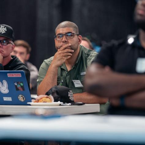 Audience watching presentation.