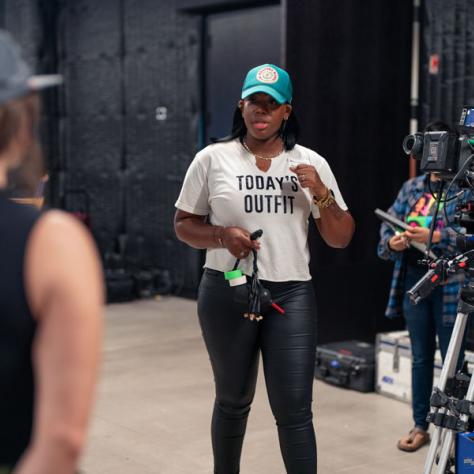 Candid photo of woman talking. 