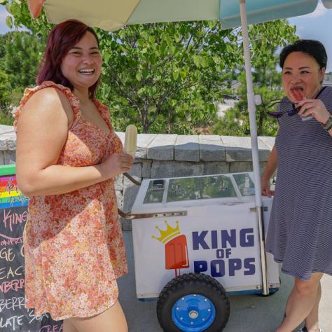 People eating ice cream. 