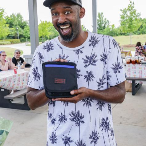 Man posing with swag. 