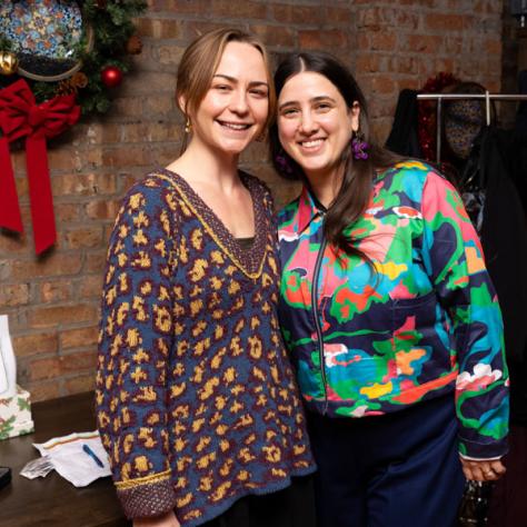 Photo of two women posing. 