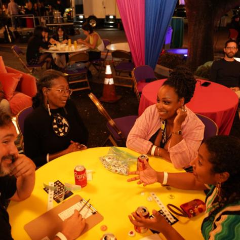 People talking at table. 