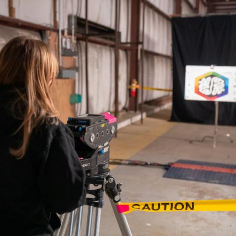 Woman working with camera. 