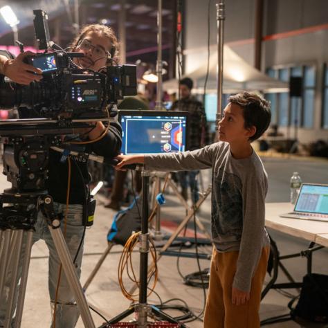 Boy working with camera. 