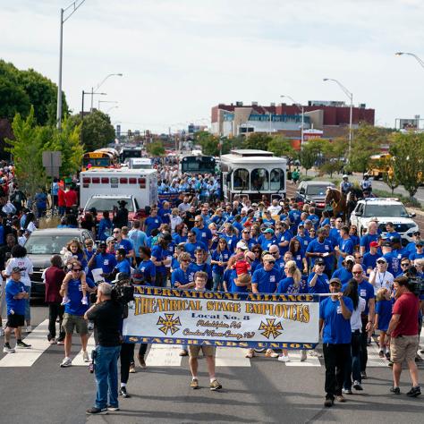 People marching in parade.