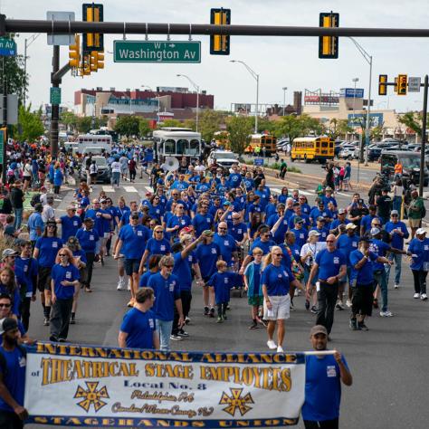 People marching in parade.