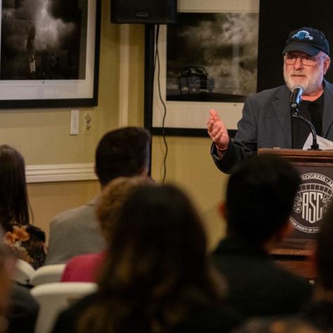 ASC Vice President Charlie Lieberman, ASC, presents the ASC Mentor Award to M. David Mullen, ASC.