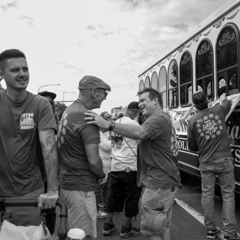 Candid photo of paradegoers, black and white photo. 