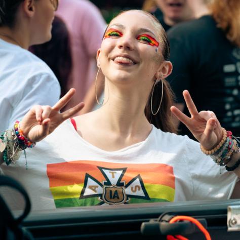 Woman posing with peace signs. 