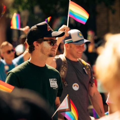 People marching in parade. 