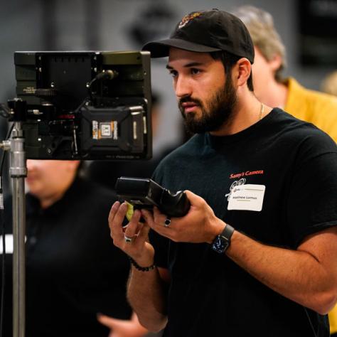 Person working with camera.