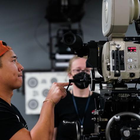 Person working with camera.