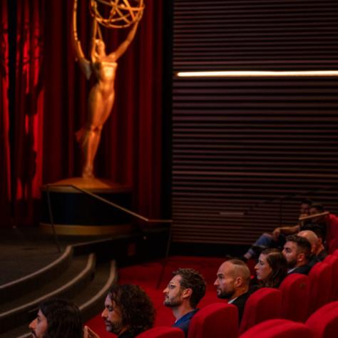 Photo of audience and stage. 