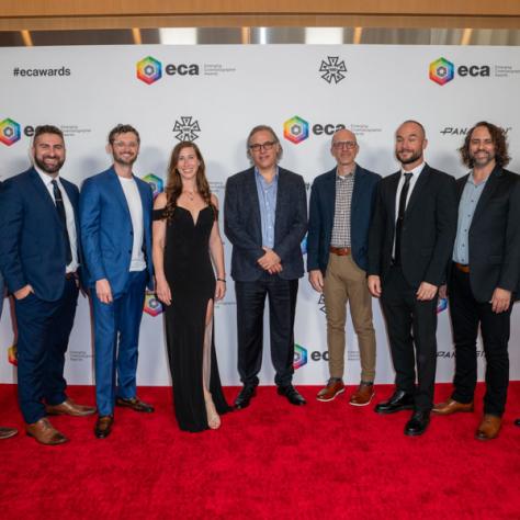 2024 Emerging Cinematographer Awards honorees (L-R) Adam Carboni, Nick Mahar, Andrew Trost, Jessica Hershatter, Dylan Trivette, Matthew Halla, Dominic Bartolone, and Allen Ho with Rodrigo Prieto, ASC, AMC (middle).