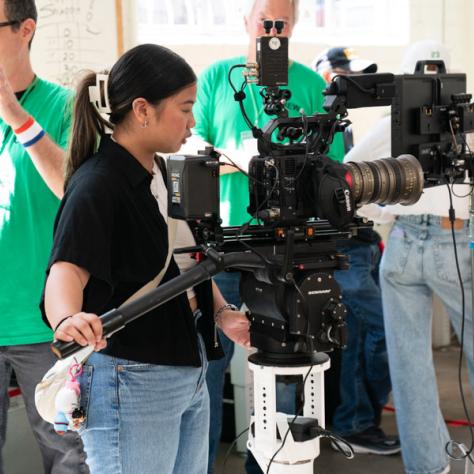 Woman working with camera. 