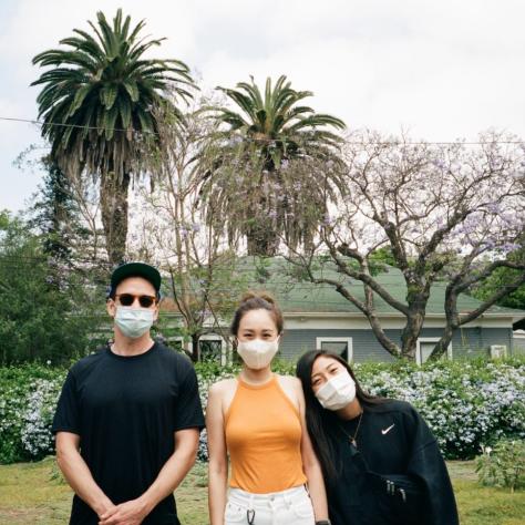 Friends walking through the neighborhood.