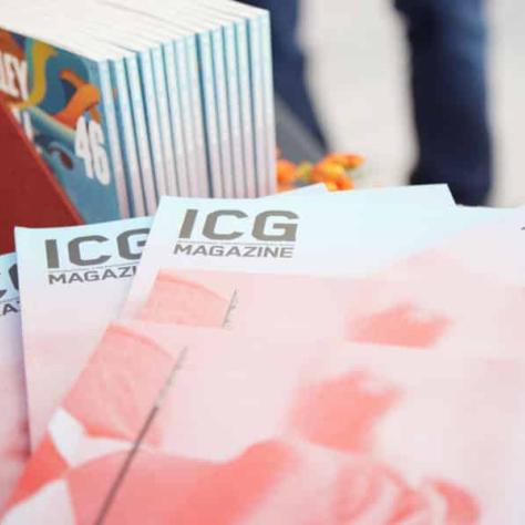 ICG pamphlet spread on table. 