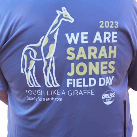 Back side of t-shirt with We Are Sarah Jones Field Day written.