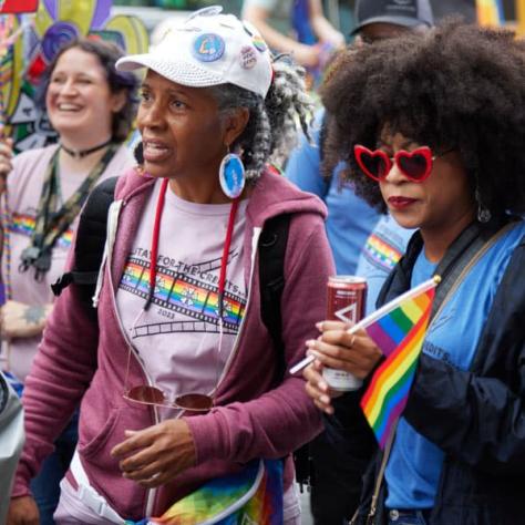 People marching at pride parade. 