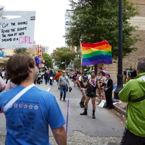 People marching in pride parade. 