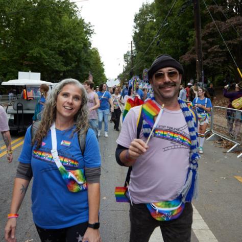 People marching in pride parade. 