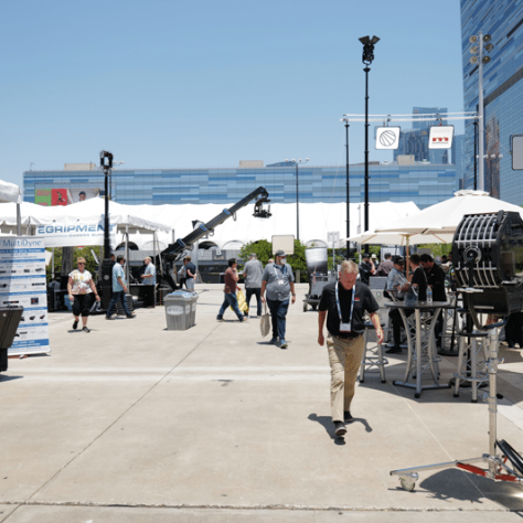 Outdoor view of people at expo.