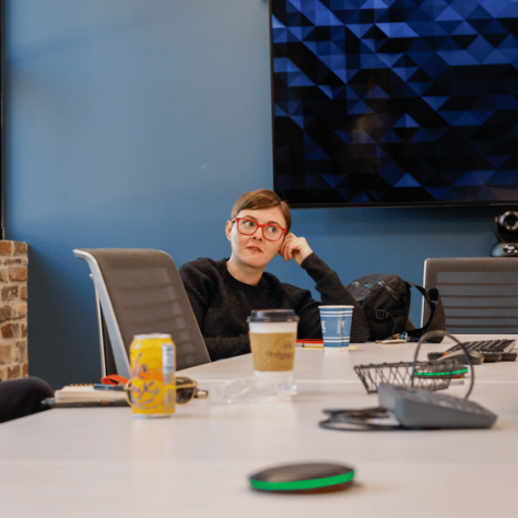 Person sitting at a table. 