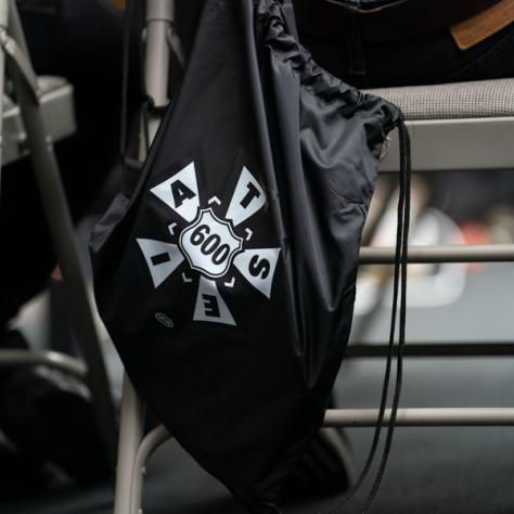 IATSE bag hanging from chair. 