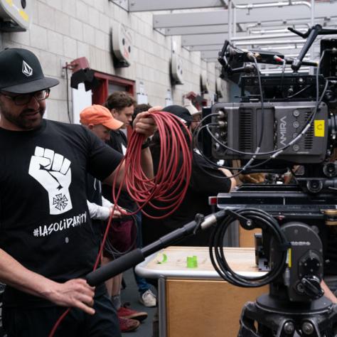 Man working with cable.