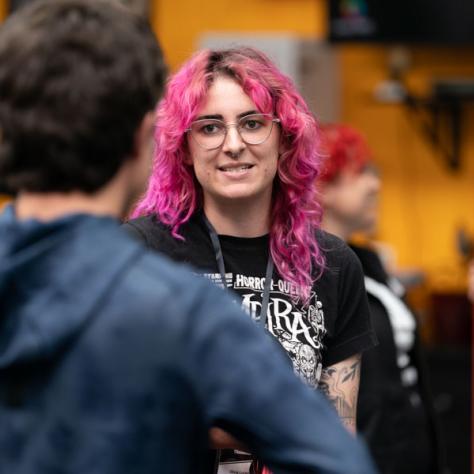 Woman with pink hair candid photo. 