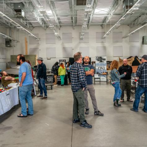 People shopping at yard sale.