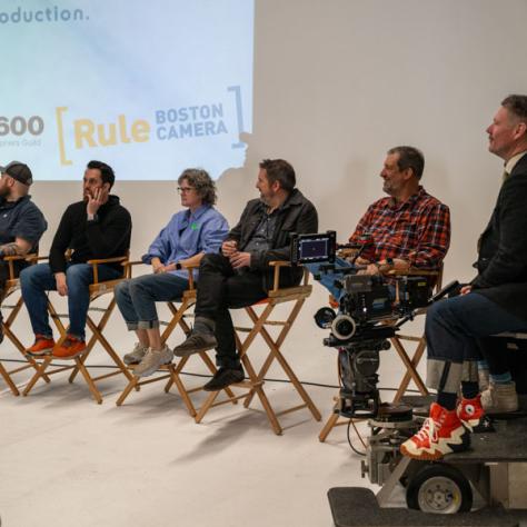 Panel speaking to audience.