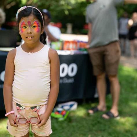 Small child with face paint. 