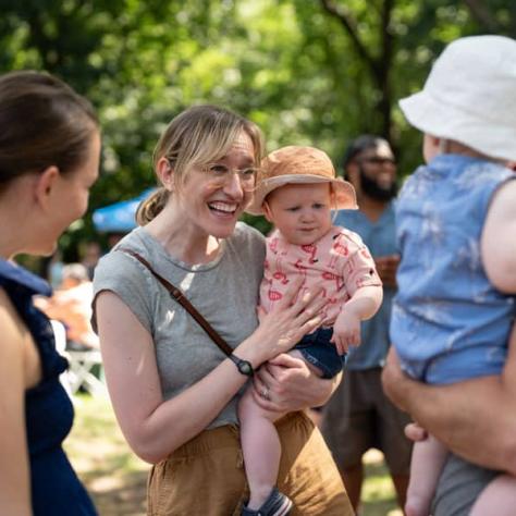 Candid photo of families talking. 