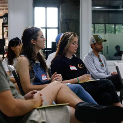 People in the audience watching. 