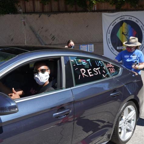 Person posing in their car. 