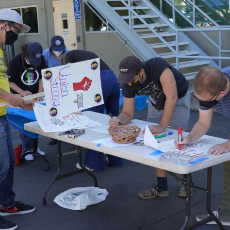 People making signs. 