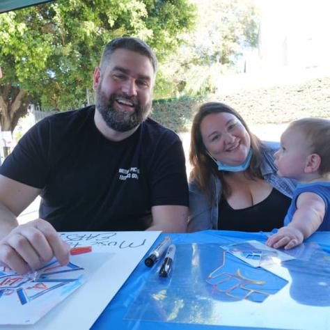 Family making signs. 