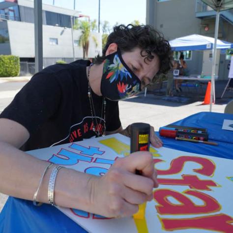 Man making a sign. 