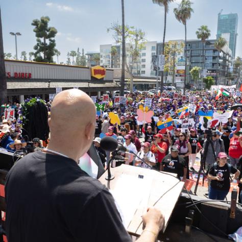 Man speaking at rally. 