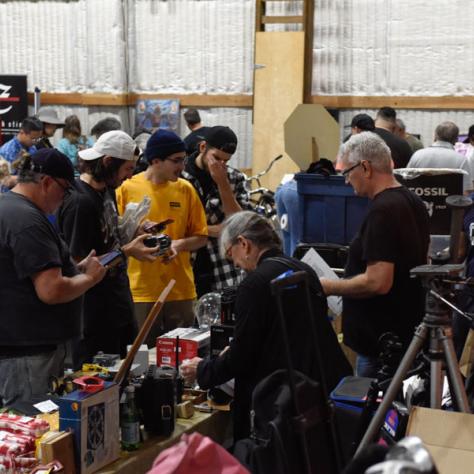 People shopping at yard sale.