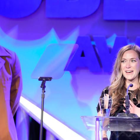 Presenter Jay Ellis and Publicist of the Year Award recipient Julia Neal (Photo by: Evans Vestal Ward/ICG)