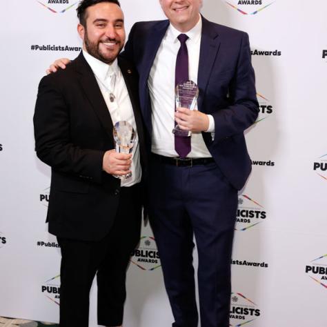 Publicists Chris Garcia Nutley, Warner Bros., and Marshall Weinbaum, Disney, celebrate their Maxwell Weinberg Award wins (Photo by: Trae Patton/ICG)