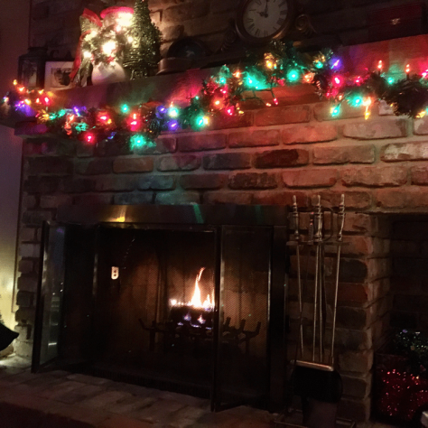 Director of Photography Jeff Barklage decorates the hearth for the holidays