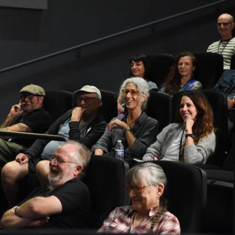 People sitting in audience. 