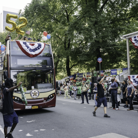 Parade float and people watching. 