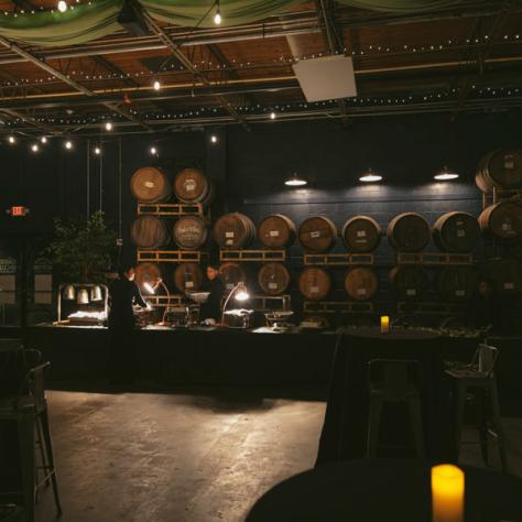 Dark photo of beer barrels. 