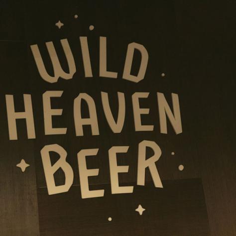 Wild Haven Beer sign on wall. 